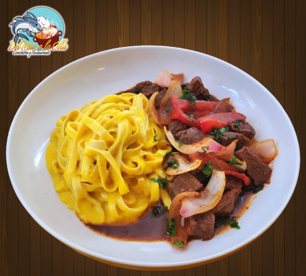 Fetuccini a la Huancaina c/ Lomo Saltado